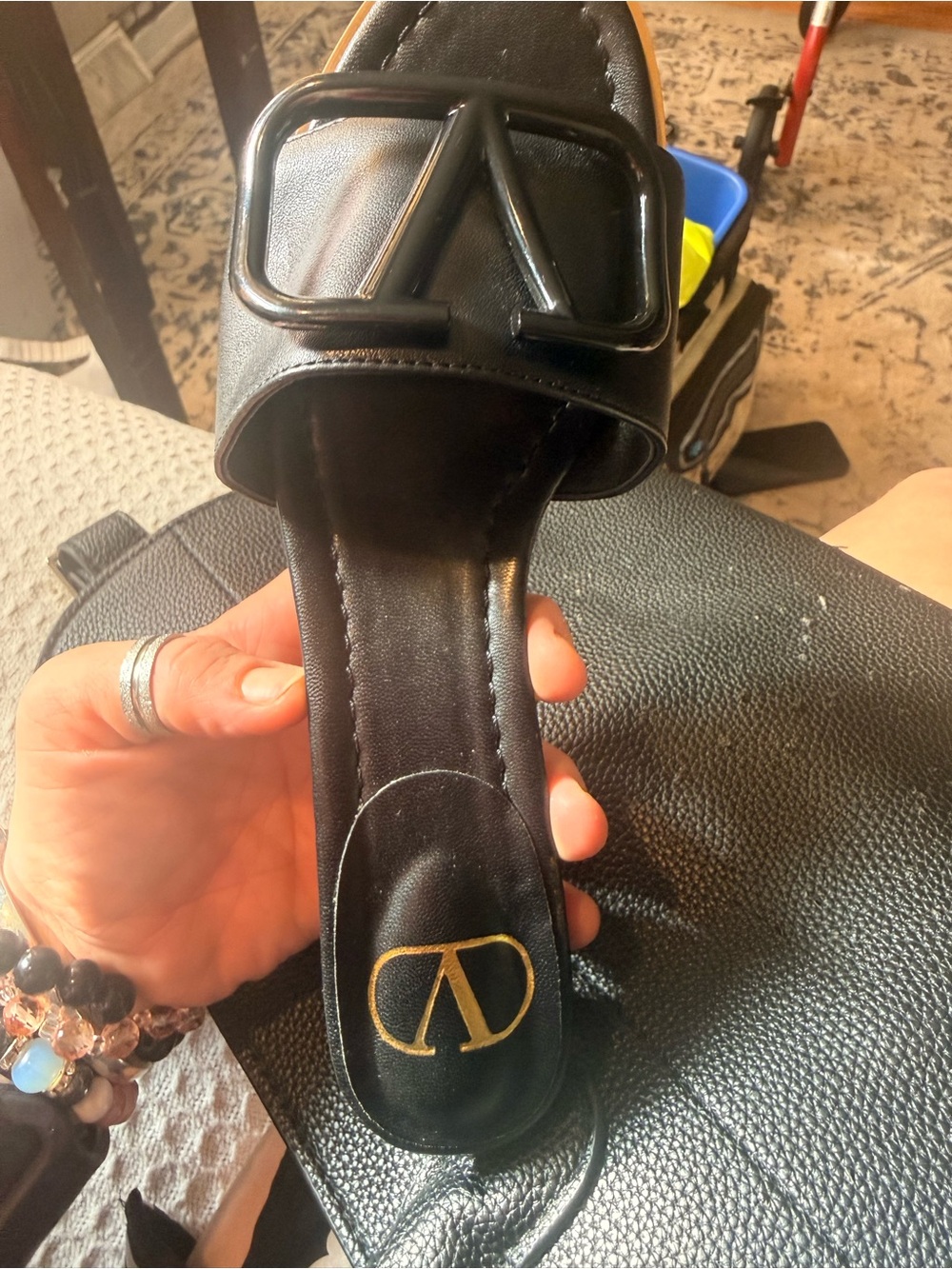 Valentino Black Slide Sandals with Gold Logo Accent